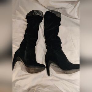 Black suede knee high heeled boots
